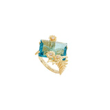 Les Nereides Blue Cut Stone And Golden Flower Ring Les Nereides Blue Cut Stone And Golden Flower Ring