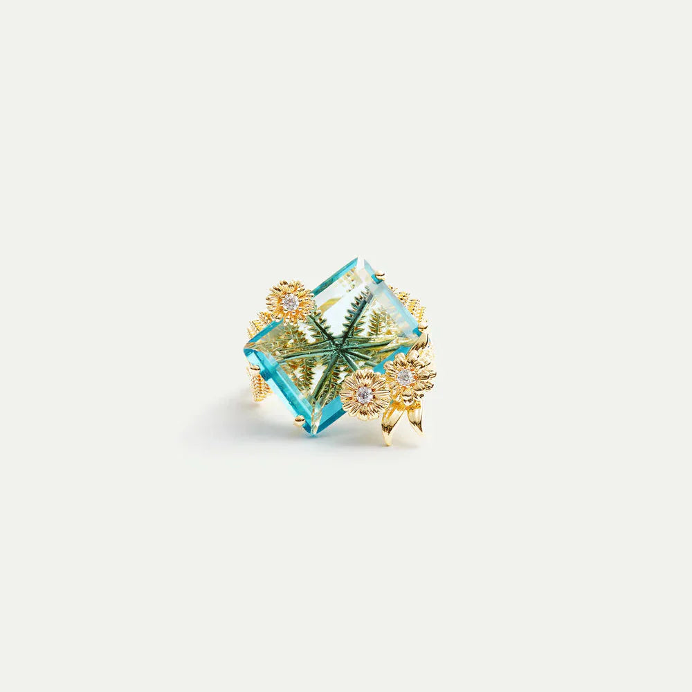 Les Nereides Blue Cut Stone And Golden Flower Ring